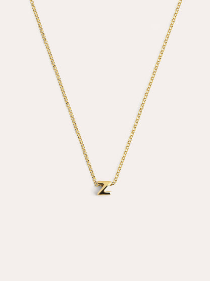 Gouden ketting met gepersonaliseerd initiaal